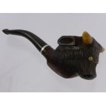 A Gentleman's Briar Pipe in the form of a horned bull's head.