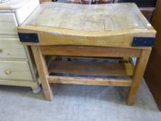 A Vintage Oak Butcher's Block, supported on a pine stand, approx 93 x 62 80 cms.