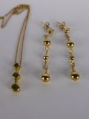 A 9 Ct Yellow Gold Lady's Peridot Drop Pendant on 9 Ct Gold Chain, together with a pair of 9 ct gold