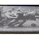 A Large Black and White Vinyl Poster Depicting Rugby, approx 190 x 233 cms.