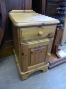 A Pine Bedside Cabinet, approx 45 x 37 x 65 cms.