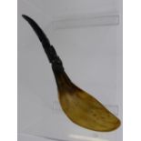 An Antique Native American Horn Ladle, the handle carved with fish, eagle and bear, possibly