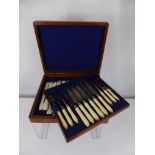 A Boxed Set of Edwardian Bone Handled Fruit Knives and Forks, 10 pcs, some in the original tissue