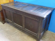 A Circa 1800 Oak Panelled Coffer, approx 140 x 60 x 68 cms, interior fitted with a candle drawer.