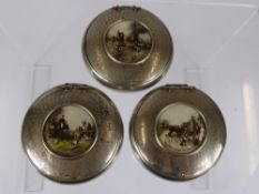 Three White Metal Circular Snuff Boxes, depicting hunting pursuits.