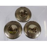 Three White Metal Circular Snuff Boxes, depicting hunting pursuits.