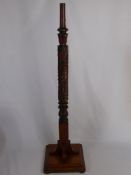 A Heavily Carved Mahogany and Oak Floor Lamp.