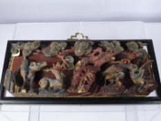 A Chinese Carved Wood Panel, carved with water birds and water buck, approx 30 x 13 cms together