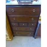 A Pair of Stagg Chests of Drawers, four long drawers and three short, on bracket feet, approx 82 x