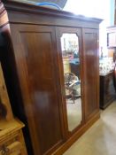 A Mahogany Wardrobe, decorative inlay to the cupboard doors, fitted interior, approx 170 x 207 x