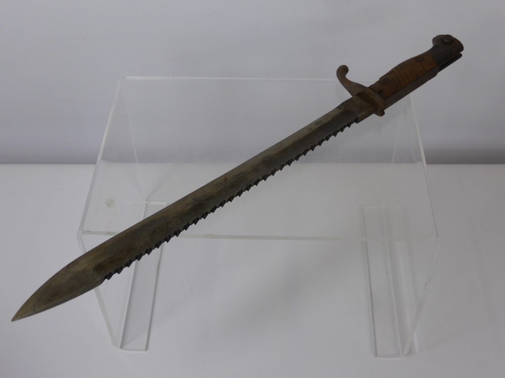 A WWI German Saw Bayonet, etched Waffenfabrik Mauser, A.G Oberndorf.