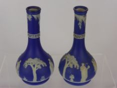 Two Cobalt Wedgwood Jasper Ware Spill Vases, depicting the three graces, approx 18 cms