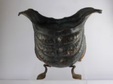 An Antique Copper Jardiniere, of naturalistic form on wrought feet, approx 42 x 27 x 35 cms