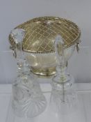 A Silver Plated Rose Bowl with lion mask handles together with two cut glass bells. (3)