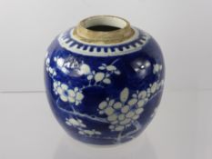 A Blue and White Ginger Jar, with prunus decoration, double rings to base.