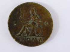 A Bronze Roman Coin, depicting Nero Claudius Caesar laureate head left, the coin back depicts