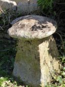 An Antique Cotswold Staddle Stone, approx 65 cms dia, on square base, some loss to top.