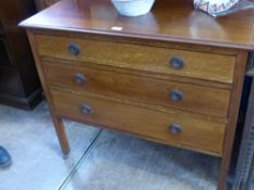 An Edwardian Mahogany Chest, with inlaid gallery and inlay to three drawers with ring handles, on