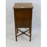 An Edwardian Sewing Table, three drawers, decorative carving and cross stretchers, approx 35x 35 x