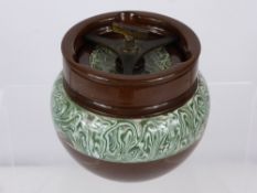 A Victorian Marble Glaze and Brown Ceramic Tobacco Jar, with a lockable screw down lid together with