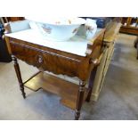 A Mahogany Marble Top Wash Stand, with carved towel rail, supported on turned legs with lower shelf,