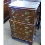 A Walnut Veneer Chest of Drawers, comprising five drawers with swan neck brass handles, approx 43