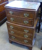 A Walnut Veneer Chest of Drawers, comprising five drawers with swan neck brass handles, approx 43