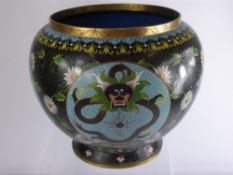 An Antique Qing Dynasty Chinese Cloisonné Jardiniere, of decorative design depicting a chasing