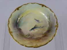 Three Hand Painted Cabinet Plates, one depicting fish signed (R. Hardy), two depicting birds. (3)