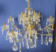 A Brass Eight Branch Glass Ceiling Chandelier,