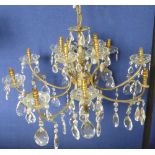 A Brass Eight Branch Glass Ceiling Chandelier,