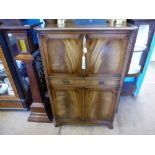 A Reproduction Mirror Backed Drinks Cabinet, single drawer to centre, twin cupboards beneath, approx