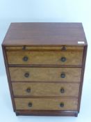 A Cornucopia Yacht Company Mahogany and Walnut Fronted Bedside Cabinet, the cabinet having four