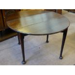 A Georgian Mahogany Drop Leaf Table, supported on pad feet, approx