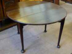 A Georgian Mahogany Drop Leaf Table, supported on pad feet, approx