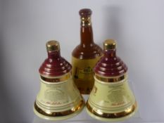 Three Porcelain Bell Shaped Whisky Bottles, comprising two Extra Special Bells 70 cl each and one 75