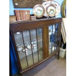 An Edwardian Leslie Belcher (Art House Furniture), glazed bow fronted display cabinet, two glass