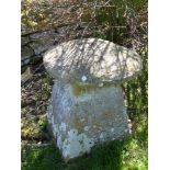 An Antique Cotswold Staddle Stone, approx 67 cms dia, on square base, some loss to top.