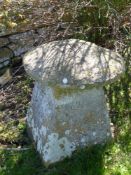 An Antique Cotswold Staddle Stone, approx 67 cms dia, on square base, some loss to top.