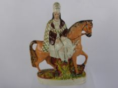 A 19th Century Staffordshire Flat Back Figure, depicting Bonny Prince Charlie in Highland attire