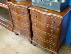 A Pair of Mahogany Bedside Cabinets, serpentine front with four drawers, on bracket feet, approx
