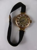 A Lady's Antique 9 Ct Gold Half Hunter Wrist Watch, the watch case mm A.G.R., case no. 1037095.