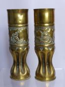 A Pair of WWI Brass 'Trench Art' Shells, the shells engraved to bottom "Remington UMC 75 DEC".