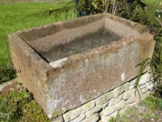 An Antique Rectangular Red StoneTrough, approx 39 x 103 x 62 cms.