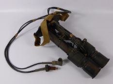 A Set of Cast Iron WWII "Tabby" Infra Red Night Vision Binoculars. The binoculars powered by a 12