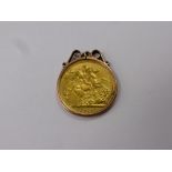 A 1912 George V Gold Full Sovereign, in 9 ct gold mount.