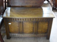 An Oak Panelled Chest, on straight feet, approx 92 x 46 x 53 cms.