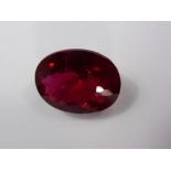 An Oval Red Topaz Loose Stone, 27.18 ct, 20.9 x 16 x 8.4 mm.