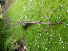 An Antique Metal Plough.