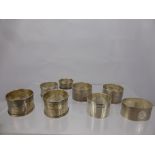 Seven Silver Napkin Rings, of various hallmarks, approx 176 gms.